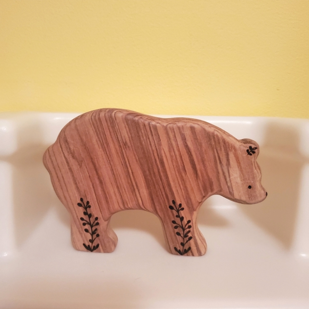 Handmade and engraved wooden bear